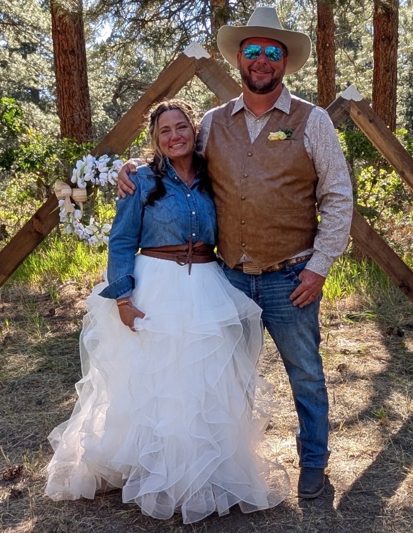 Carol and her husband in the Colorado mountains